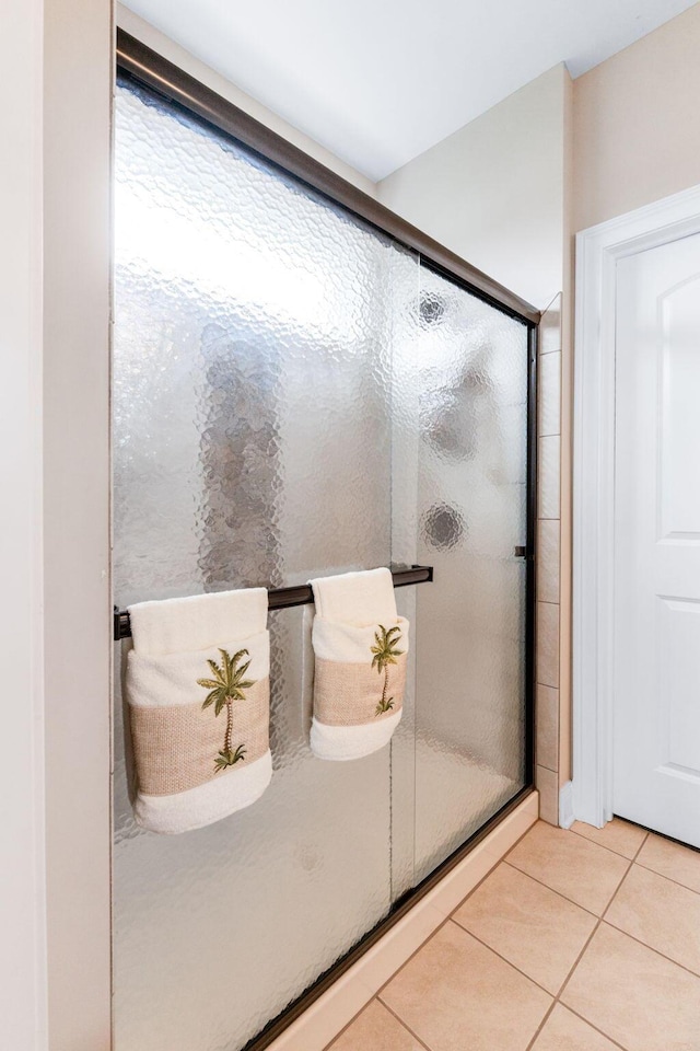 6540 Marshview Dr, Hilliard, OH 43026 - bathroom featuring tile patterned floors and a stall shower