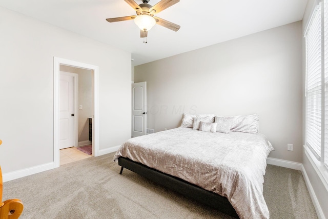 6540 Marshview Dr, Hilliard, OH 43026 - bedroom featuring light carpet, baseboards, and ceiling fan