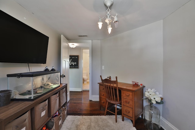 office with wood finished floors and baseboards