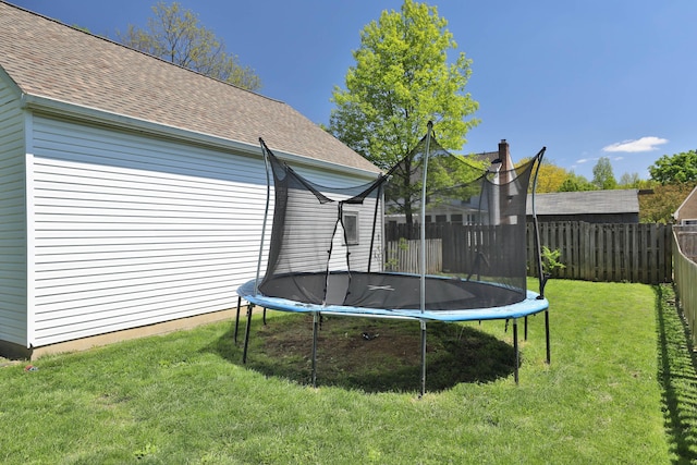 view of yard featuring a trampoline