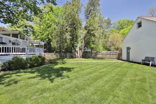 view of yard with a deck
