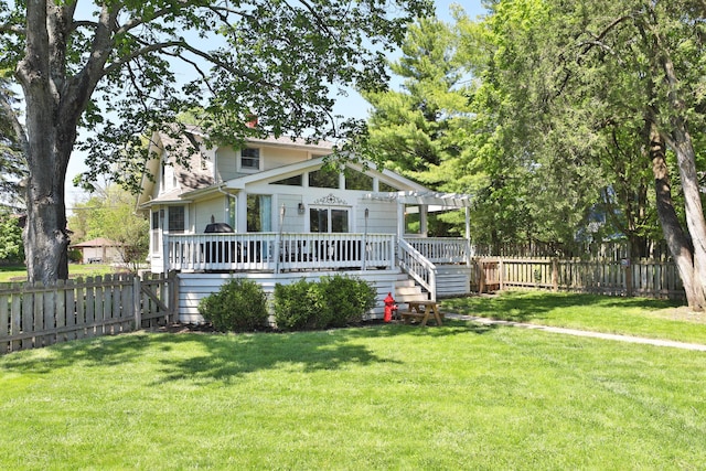 view of front of home with a deck and a pergola