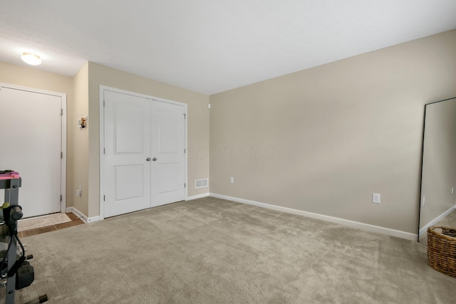 389 Laurel Creek St, Pickerington, OH 43147 - unfurnished bedroom with carpet floors, baseboards, and a closet