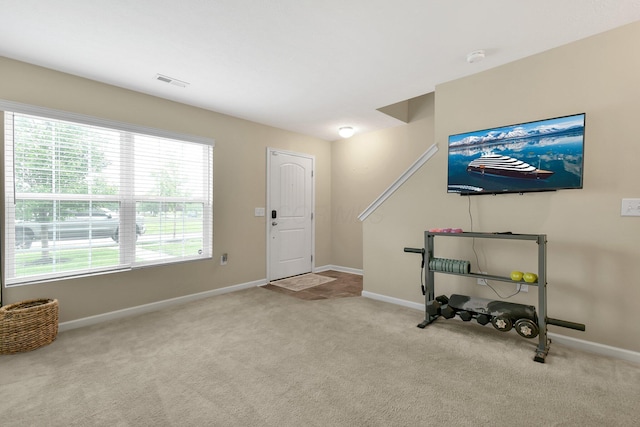 389 Laurel Creek St, Pickerington, OH 43147 - unfurnished living room with carpet floors and baseboards