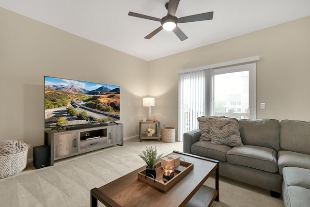 389 Laurel Creek St, Pickerington, OH 43147 - living area featuring light colored carpet, a ceiling fan, and baseboards