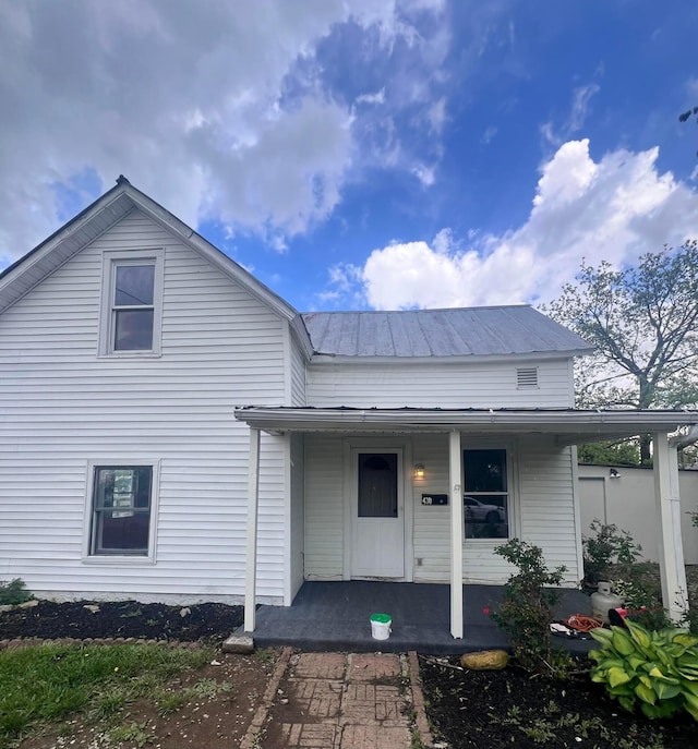 430 Poplar St, West Union, OH 45693 - view of front of home with a porch and metal roof