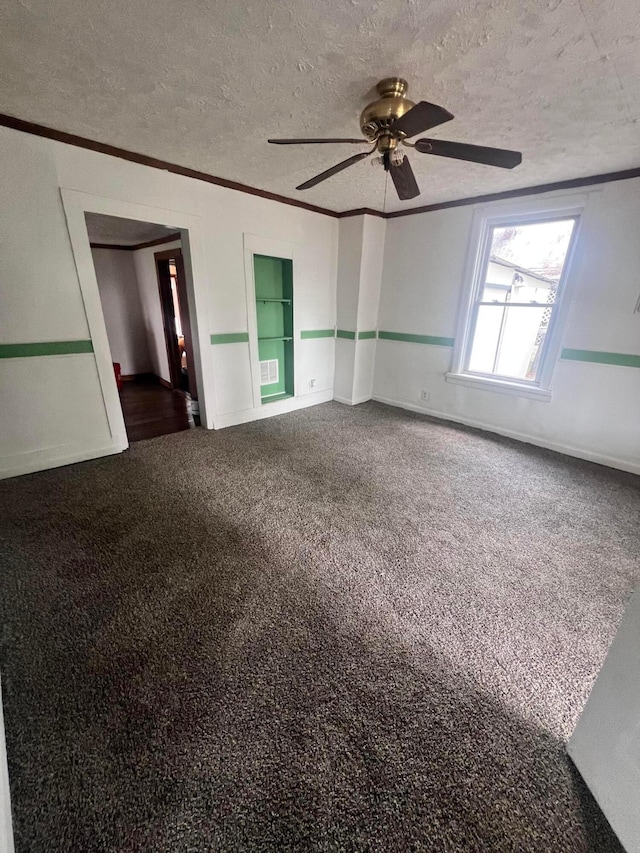 430 Poplar St, West Union, OH 45693 - carpeted spare room featuring ceiling fan, a textured ceiling, crown molding, and baseboards