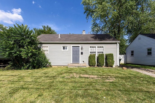 3250 Karl Rd, Columbus, OH 43224 - rear view of house with a yard