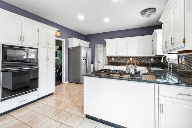 10164 Busey Rd, Canal Winchester, OH 43110 - kitchen featuring black appliances, backsplash, white cabinets, and recessed lighting