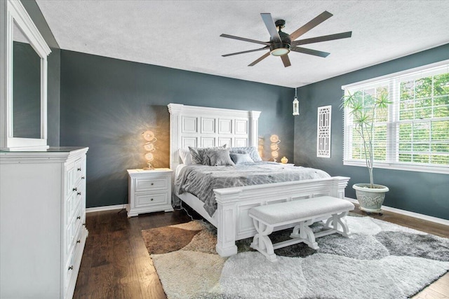 10164 Busey Rd, Canal Winchester, OH 43110 - bedroom with dark wood finished floors, a textured ceiling, and a ceiling fan