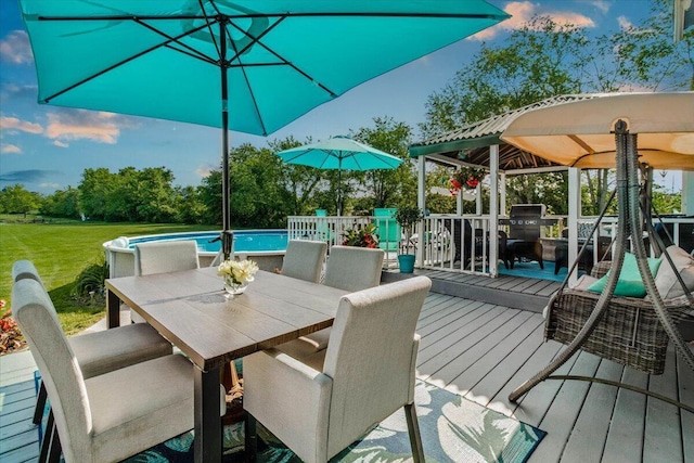 10164 Busey Rd, Canal Winchester, OH 43110 - wooden terrace featuring an outdoor pool, outdoor dining area, a gazebo, and a lawn