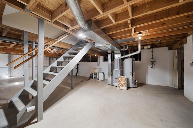unfinished basement with gas water heater, heating unit, and stairs