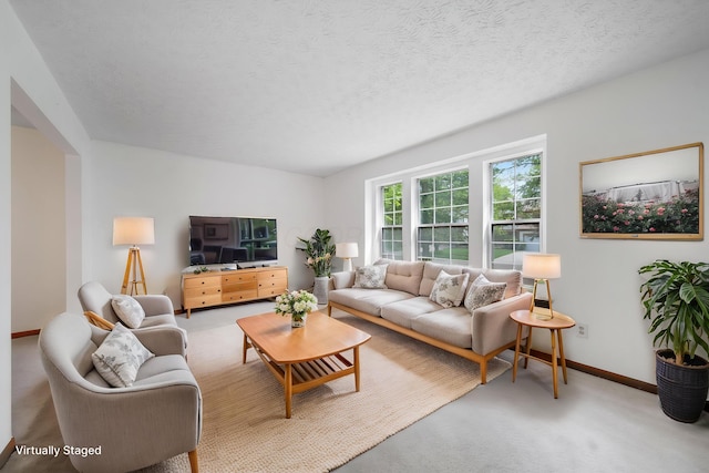 living room with carpet flooring and baseboards