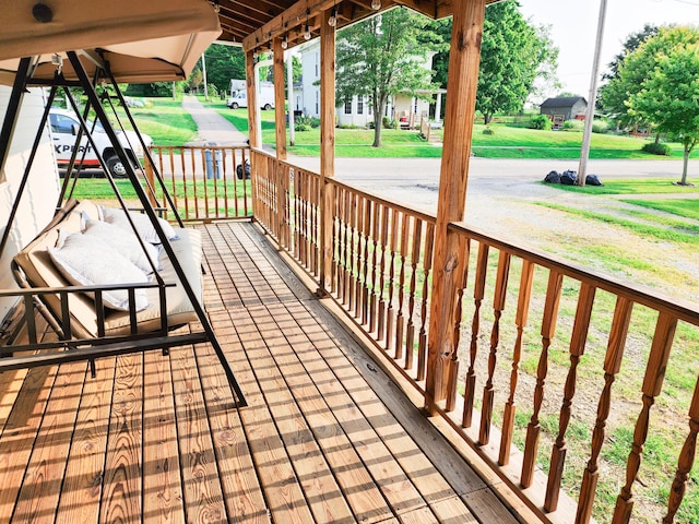 8696 Main St, Rushville, OH 43150 - wooden deck with a porch