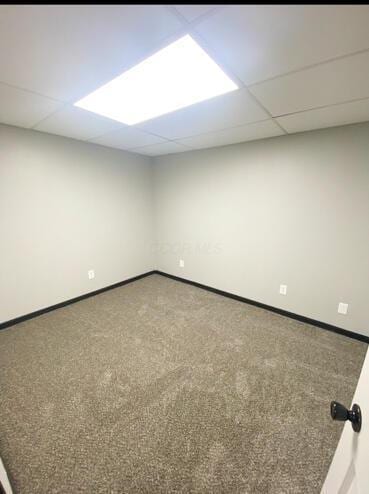 8696 Main St, Rushville, OH 43150 - carpeted spare room featuring a drop ceiling and baseboards