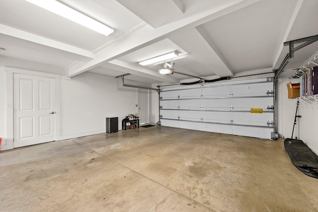 103 Lundy St, Columbus, OH 43215 - garage featuring a garage door opener