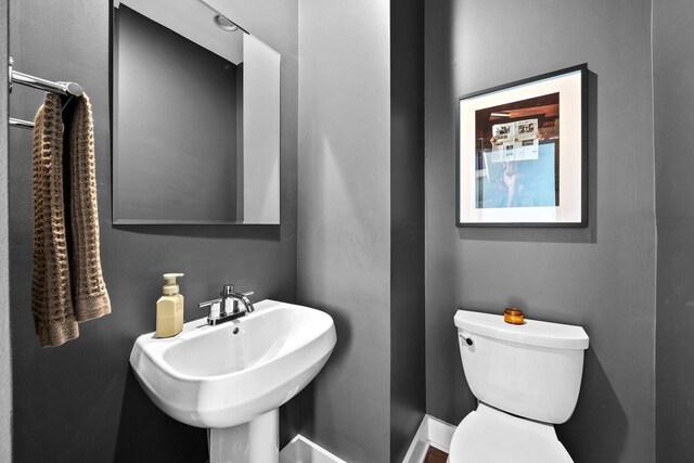 103 Lundy St, Columbus, OH 43215 - half bathroom with toilet and a sink