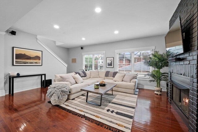 103 Lundy St, Columbus, OH 43215 - living area featuring a fireplace, wood-type flooring, recessed lighting, and baseboards