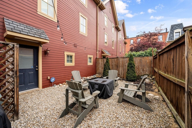 103 Lundy St, Columbus, OH 43215 - fenced backyard featuring an outdoor fire pit