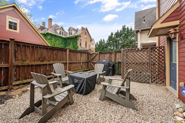 103 Lundy St, Columbus, OH 43215 - fenced backyard featuring a fire pit
