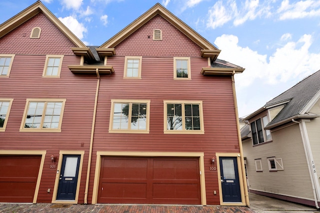 103 Lundy St, Columbus, OH 43215 - view of property with an attached garage