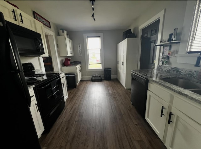 44 King Ave, Newark, OH 43055 - kitchen with black appliances, white cabinets, dark wood-type flooring, light stone countertops, and a sink