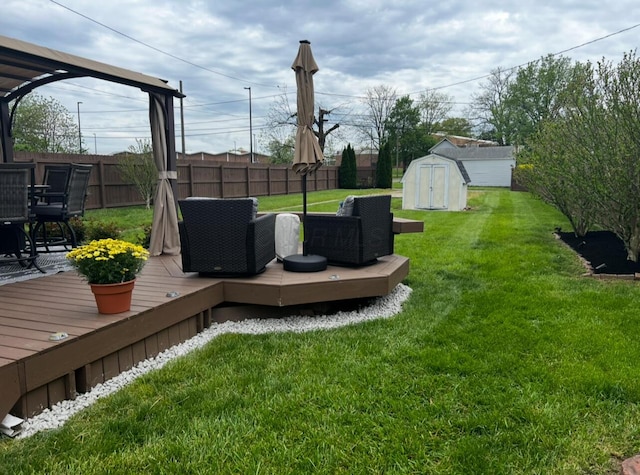 44 King Ave, Newark, OH 43055 - view of yard with a shed, a wooden deck, and an outbuilding