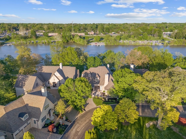 aerial view of residential area with a nearby body of water