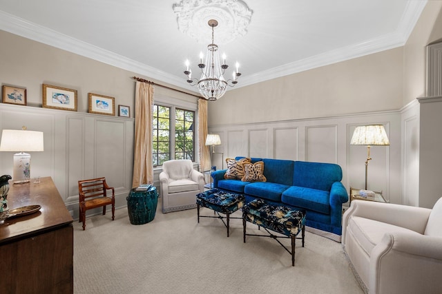living area with a decorative wall, a chandelier, ornamental molding, carpet flooring, and wainscoting