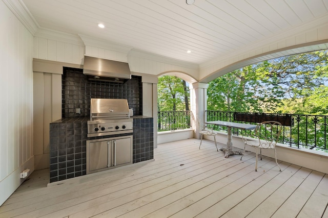 deck with grilling area and an outdoor kitchen