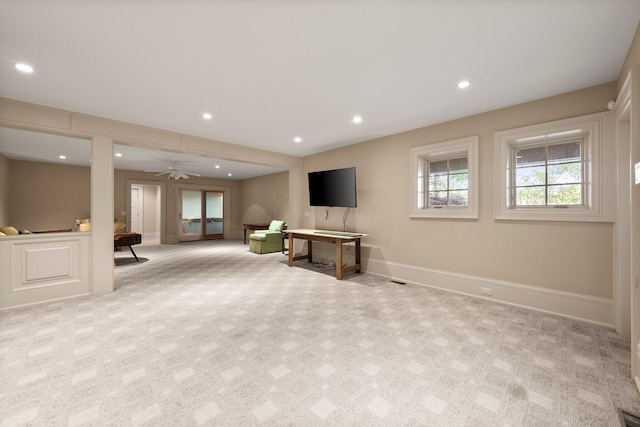 unfurnished living room featuring carpet flooring, recessed lighting, and baseboards