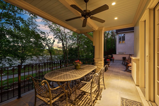 view of patio with a ceiling fan and outdoor dining space