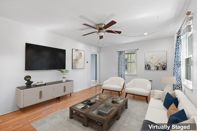 3204 Mcguffey Rd, Columbus, OH 43224 - living room with ceiling fan, wood finished floors, and recessed lighting