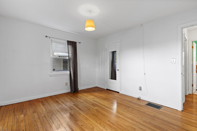 3204 Mcguffey Rd, Columbus, OH 43224 - empty room with light wood finished floors and baseboards