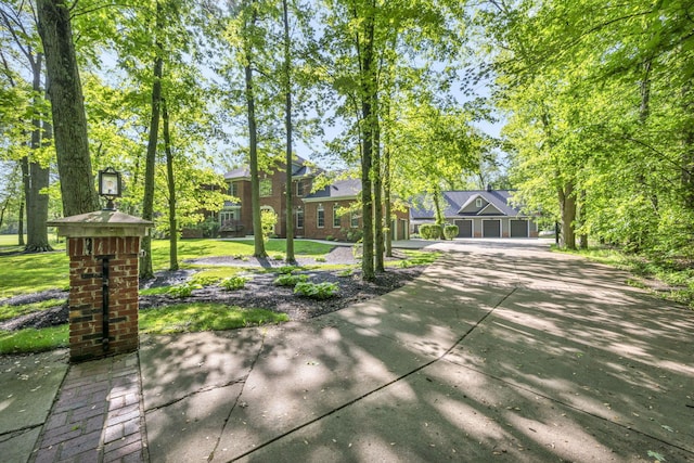 3720 Hyatts Rd, Powell, OH 43065 - view of front of property with a front lawn and concrete driveway