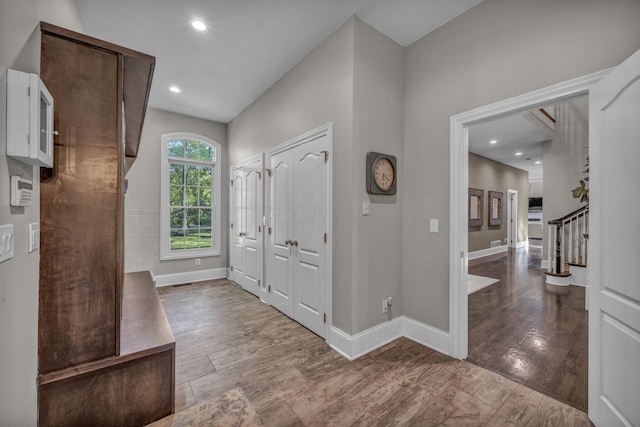 3720 Hyatts Rd, Powell, OH 43065 - foyer featuring stairs, wood finished floors, recessed lighting, and baseboards