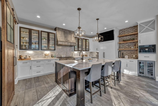 3720 Hyatts Rd, Powell, OH 43065 - kitchen with wine cooler, custom exhaust hood, open shelves, backsplash, and recessed lighting