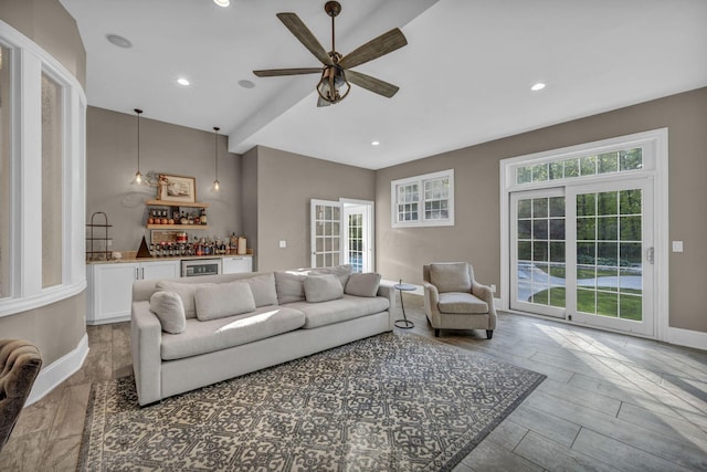3720 Hyatts Rd, Powell, OH 43065 - living area with bar area, ceiling fan, baseboards, recessed lighting, and wine cooler