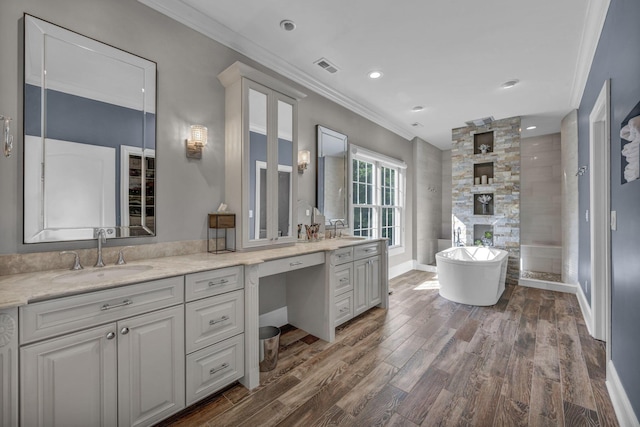 3720 Hyatts Rd, Powell, OH 43065 - bathroom with crown molding, double vanity, wood finished floors, walk in shower, and a soaking tub