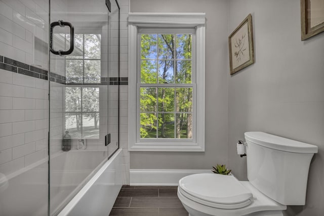 3720 Hyatts Rd, Powell, OH 43065 - full bathroom with toilet, enclosed tub / shower combo, and baseboards