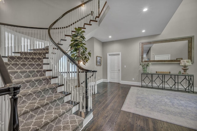 3720 Hyatts Rd, Powell, OH 43065 - stairway featuring baseboards, wood finished floors, and recessed lighting