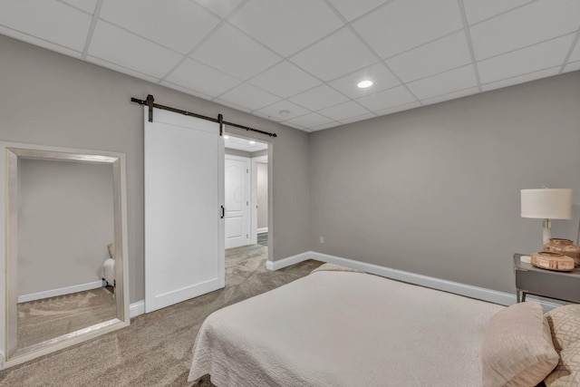 3720 Hyatts Rd, Powell, OH 43065 - bedroom featuring a barn door, carpet flooring, a drop ceiling, baseboards, and recessed lighting