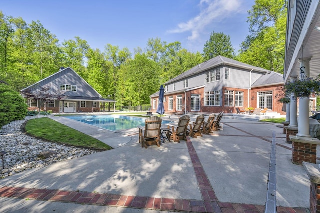 3720 Hyatts Rd, Powell, OH 43065 - outdoor pool with a patio, an exterior structure, french doors, and an outbuilding
