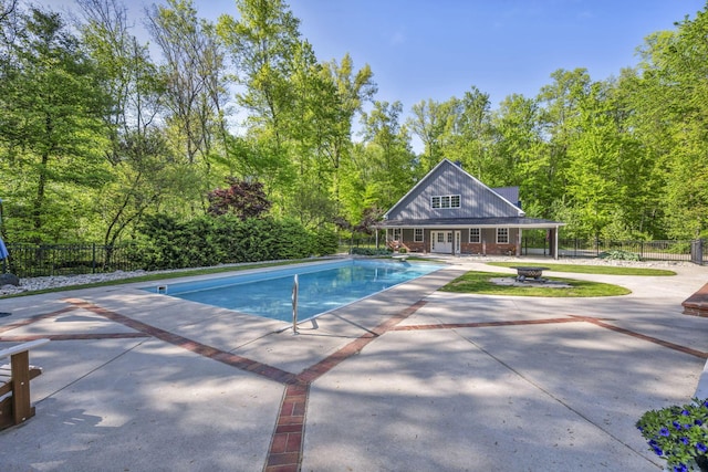 3720 Hyatts Rd, Powell, OH 43065 - view of swimming pool featuring an exterior structure, a patio, fence, and an outdoor structure