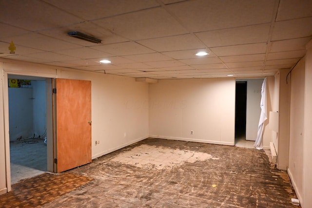 finished below grade area featuring baseboards and recessed lighting