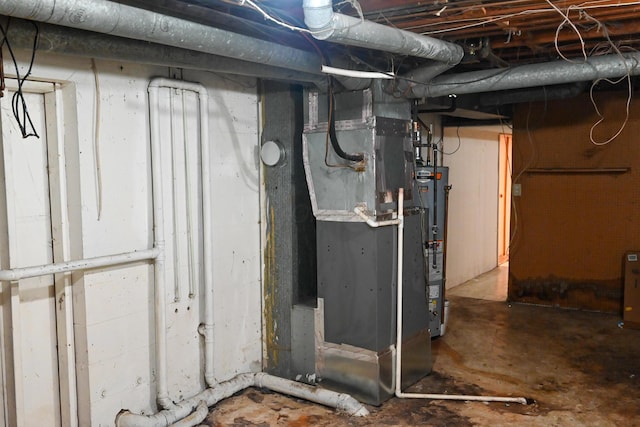 unfinished basement with gas water heater and heating unit