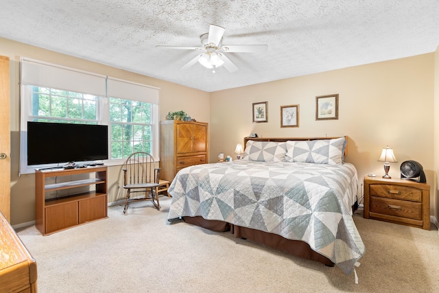 68 Whipple Pl, Westerville, OH 43081 - bedroom featuring carpet flooring, a textured ceiling, and a ceiling fan