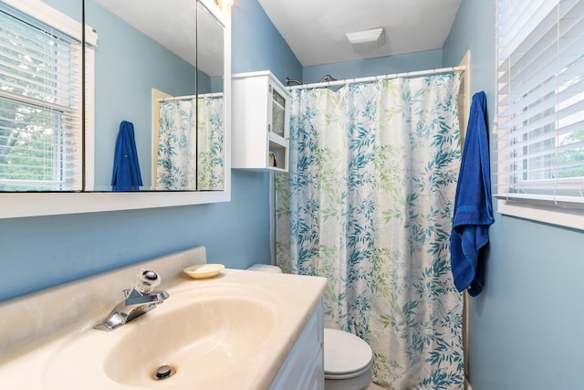 68 Whipple Pl, Westerville, OH 43081 - bathroom with toilet, vanity, and curtained shower