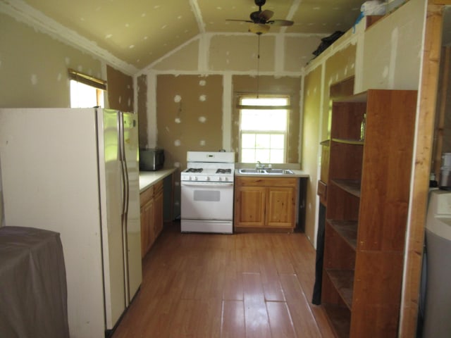 6800 Center Rd, Philo, OH 43771 - kitchen featuring white appliances, open shelves, a sink, and wood-type flooring