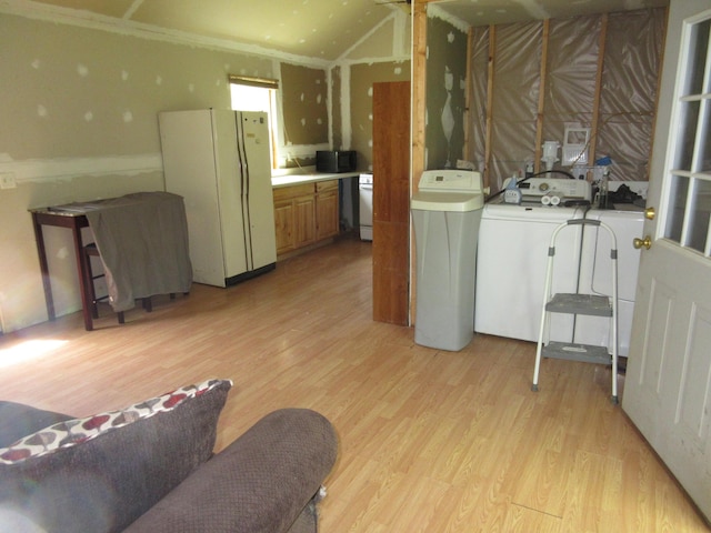 6800 Center Rd, Philo, OH 43771 - laundry area featuring washer and dryer and light wood-style floors